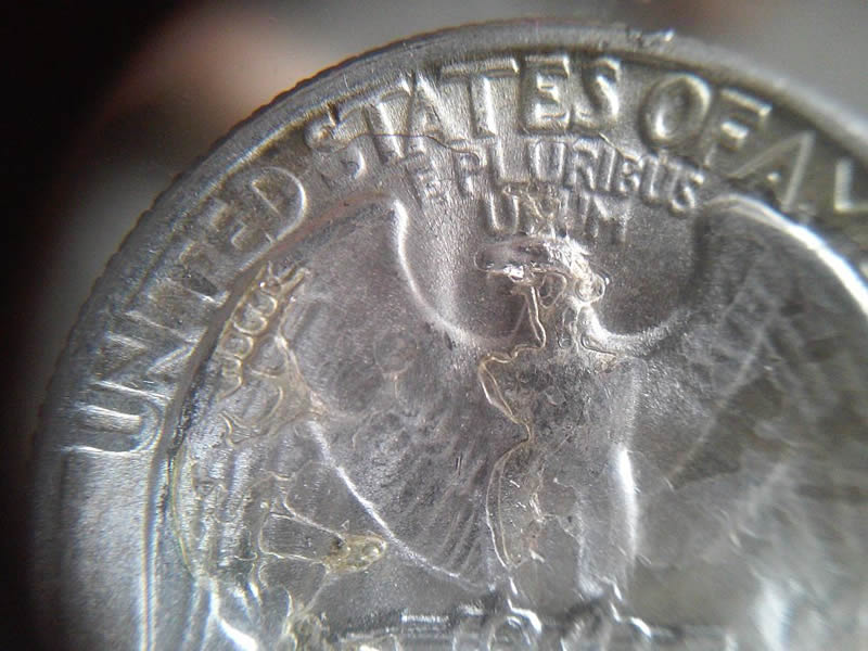 Defaced-1959-Quarter-Had-A-Resin-On-It-Pre-Production?