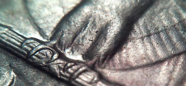 Defaced-1959-Quarter-Had-A-Resin-On-It-Pre-Production?