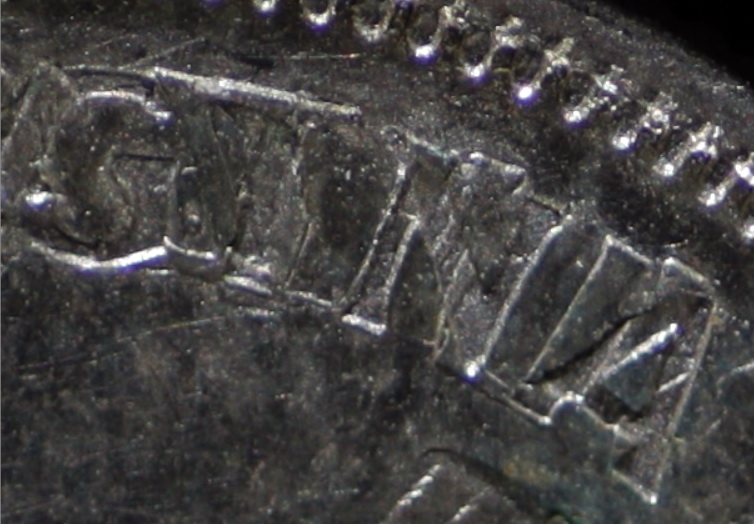 Is-This-1963-25-Cent-An-Error-Coin?-Or-A-Vise-Or-Hammer-Job?
