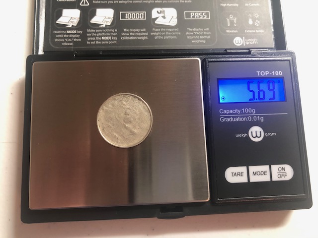 Unknown-Michigan---Error-Coin---Capped-Die-Or-Grease?