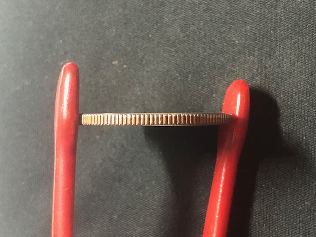 Unknown-Michigan---Error-Coin---Capped-Die-Or-Grease?