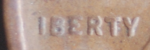 1909-VDB-Cent-With-Missing-L-In-Liberty
