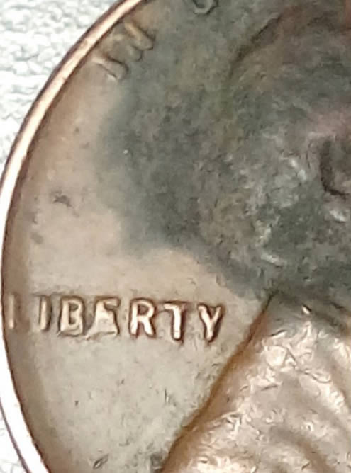 Lincoln-Wheatback-1955-Cent..-Date-And-Liberty-?
