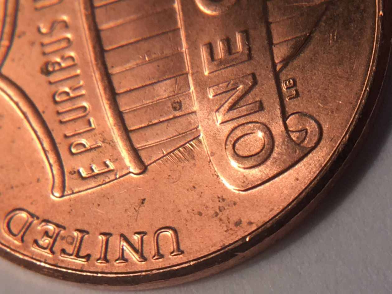 2015-D-Die-Scratches-Left-Of-Shield?