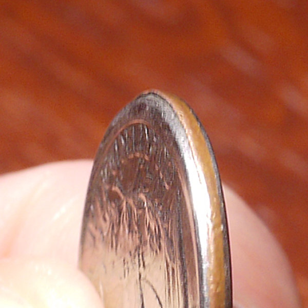Off-Center-Strike,-1993-Quarter