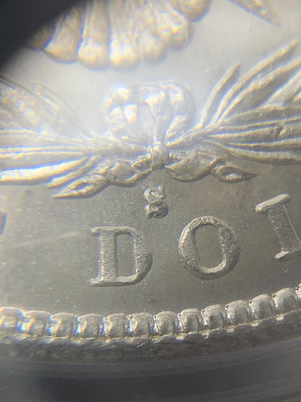 Showing-Off-A-New-Pickup.1880-S-Morgan-PCGS-MS-68-OGH