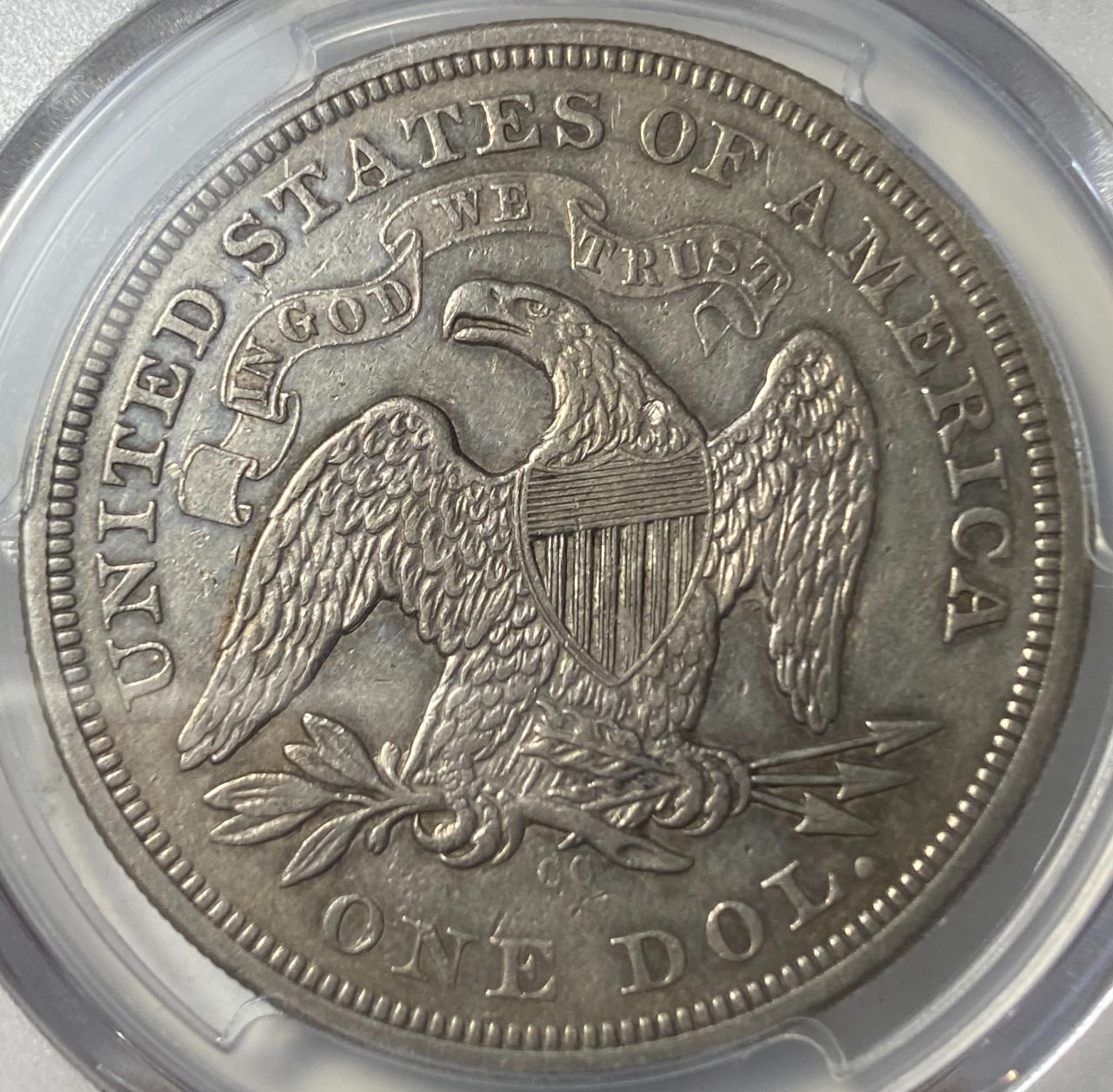 1870-CC-Seated-Liberty-Dollar.-You-Vs-PCGS!