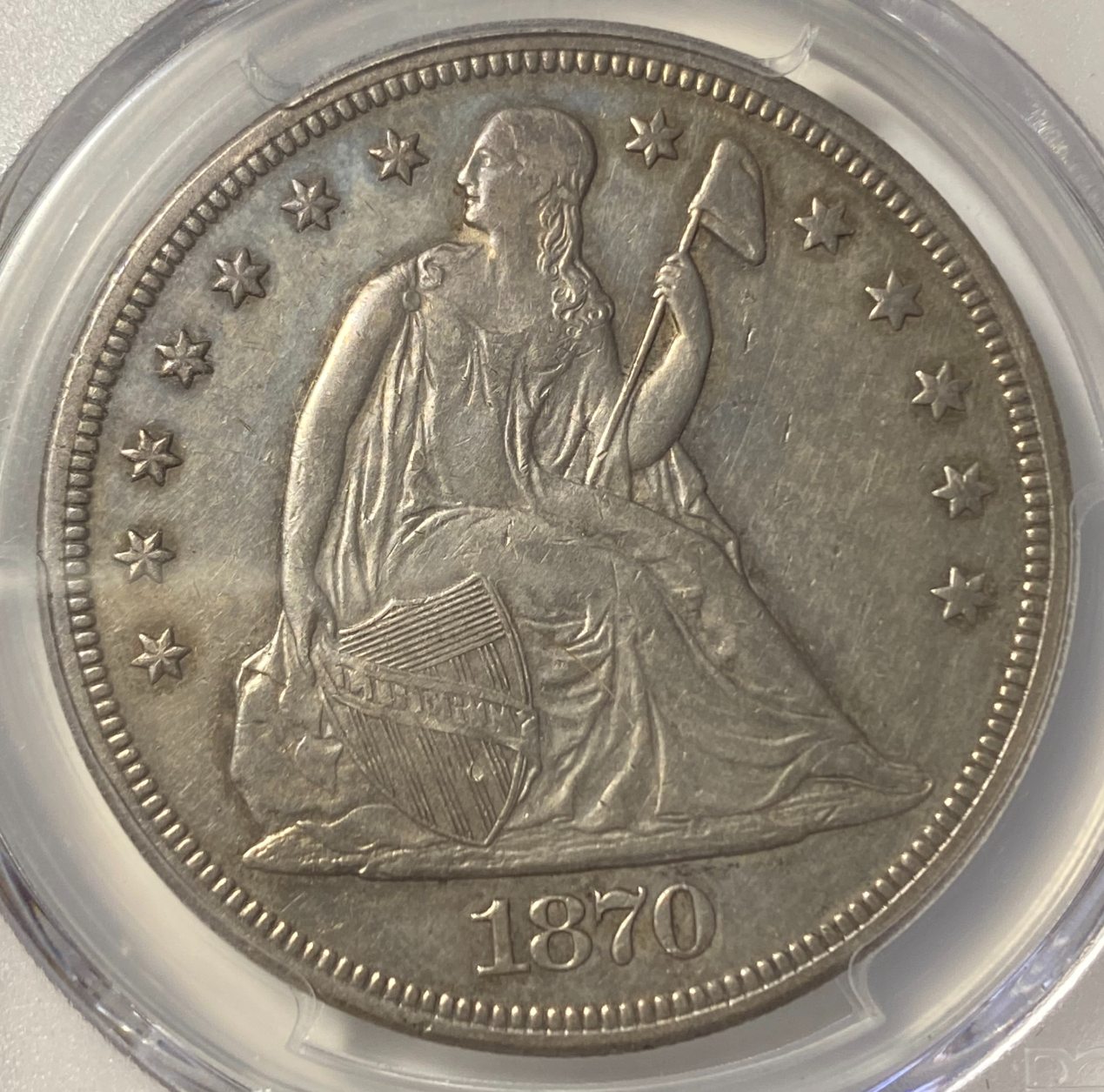 1870-CC-Seated-Liberty-Dollar.-You-Vs-PCGS!