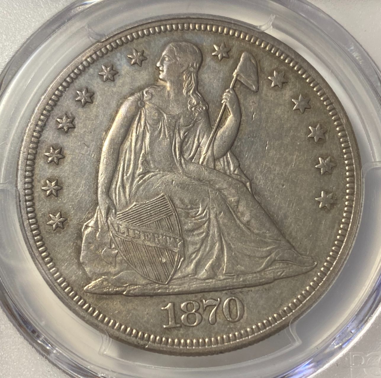 1870-CC-Seated-Liberty-Dollar.-You-Vs-PCGS!
