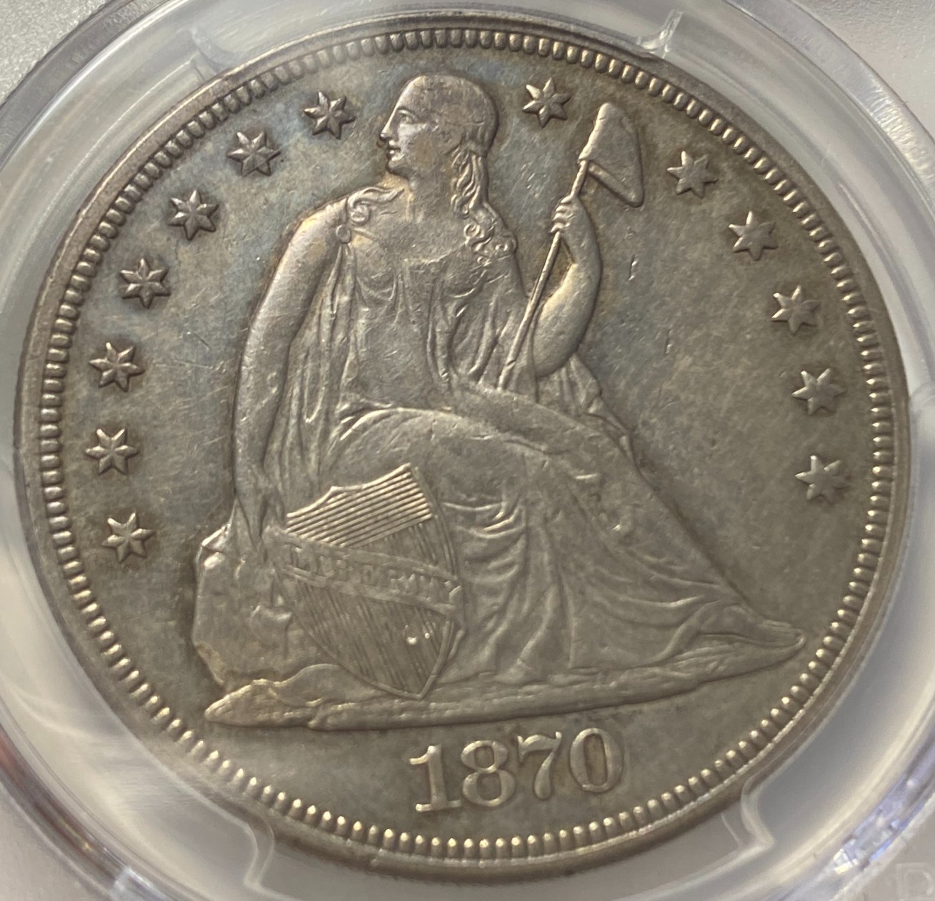 1870-CC-Seated-Liberty-Dollar.-You-Vs-PCGS!