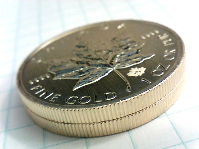 Two-Gold-Maple-Leaf-Coins-Stuck-Together.--Advice?
