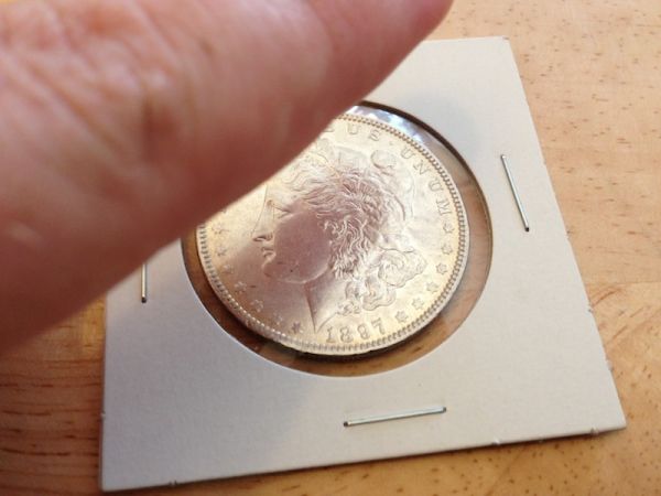 Is-This-1897-Morgan-Polished/Cleaned?