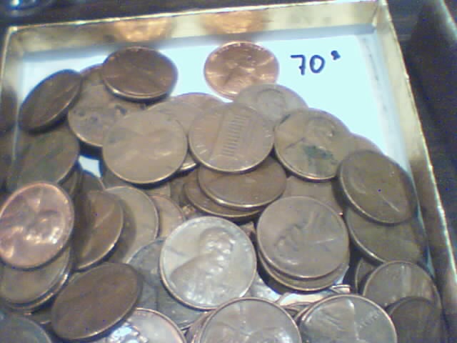 Searching-In-2500-Pennies-50-RollsPictures-Upadated