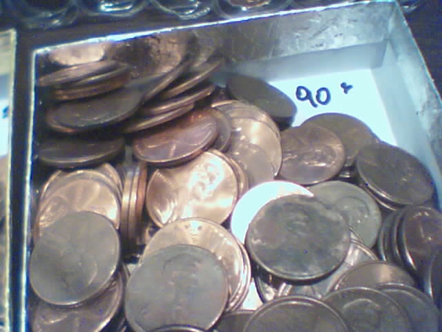 Searching-In-2500-Pennies-50-RollsPictures-Upadated