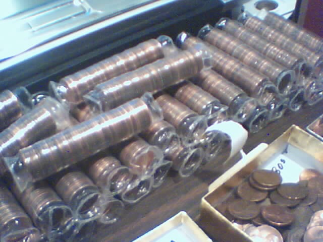 Searching-In-2500-Pennies-50-RollsPictures-Upadated