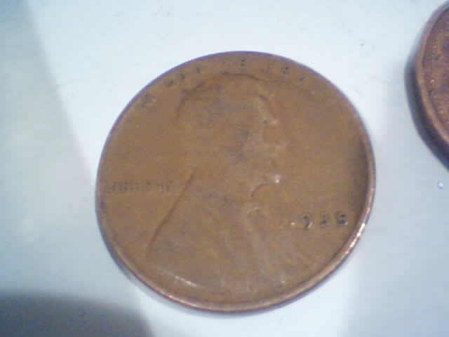 Searching-In-2500-Pennies-50-RollsPictures-Upadated