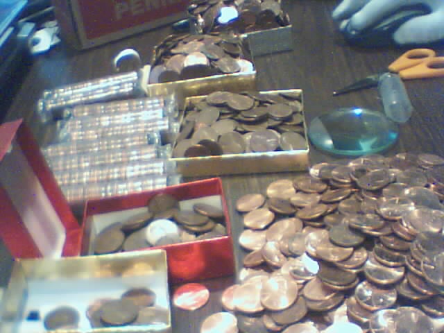 Searching-In-2500-Pennies-50-RollsPictures-Upadated
