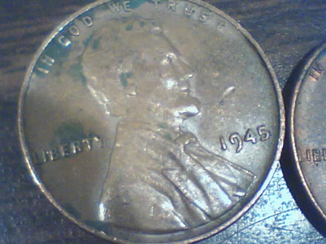 Searching-In-2500-Pennies-50-RollsPictures-Upadated
