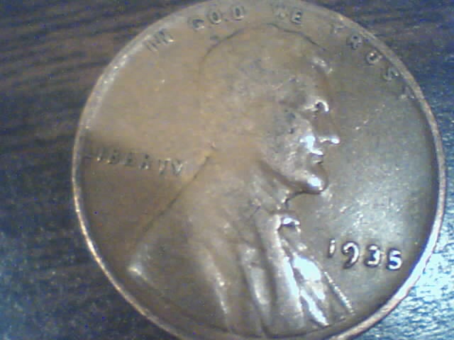 Searching-In-2500-Pennies-50-RollsPictures-Upadated