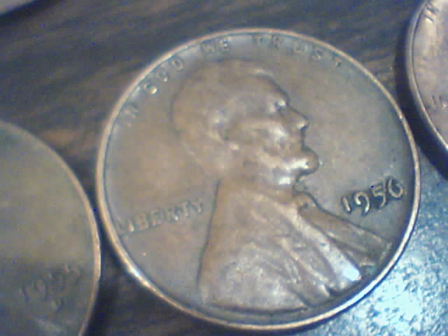 Searching-In-2500-Pennies-50-RollsPictures-Upadated