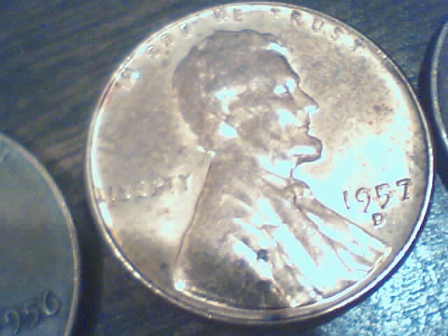 Searching-In-2500-Pennies-50-RollsPictures-Upadated