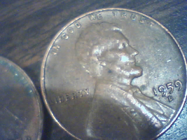 Searching-In-2500-Pennies-50-RollsPictures-Upadated