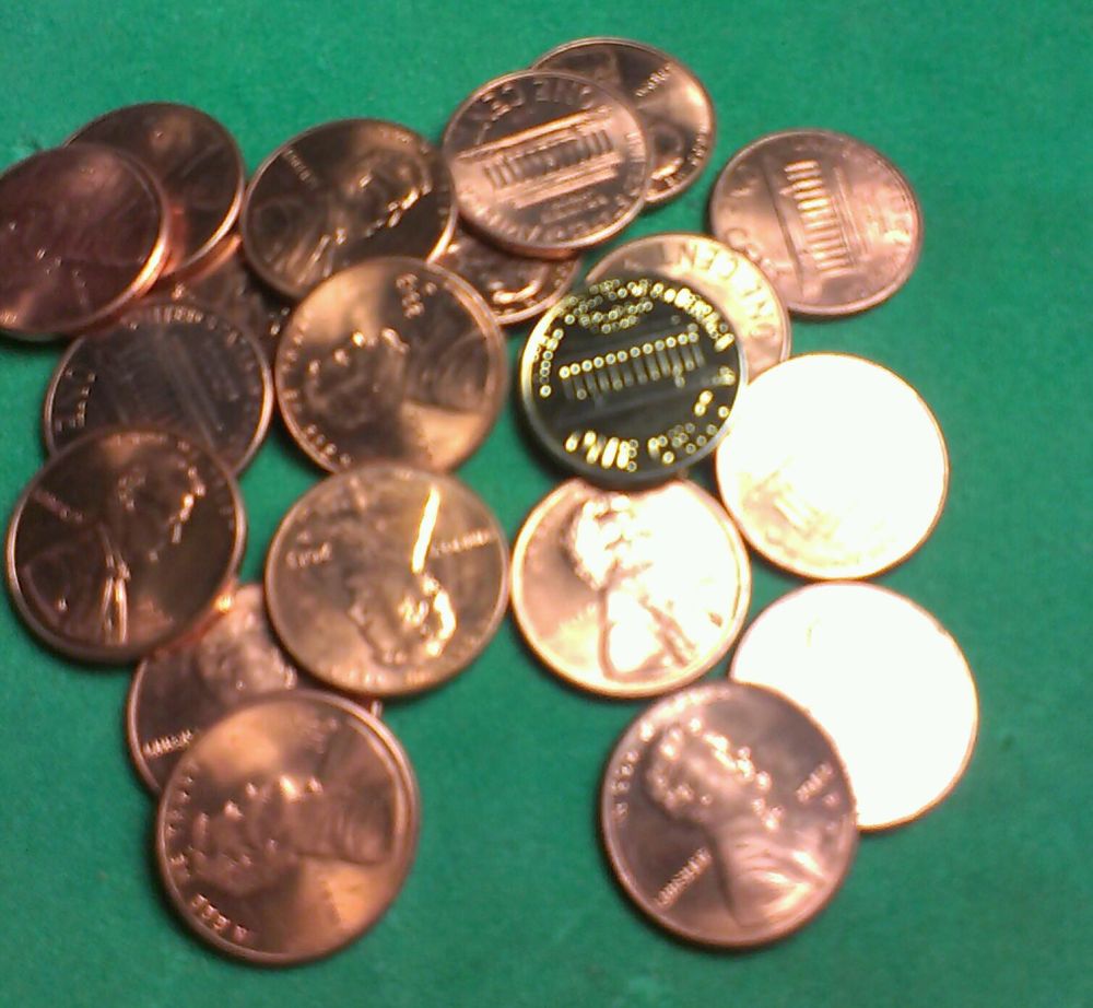 Searching-Through-Penny-Rolls-From-The-Bank-And-Up-Turns-This-Proof-Looking