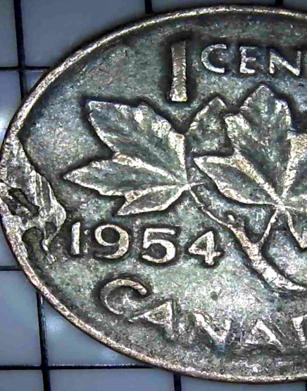 1954-One-Cent,-Need-Help?-Color-Off,-Flaw-Planchette-Near-Date?
