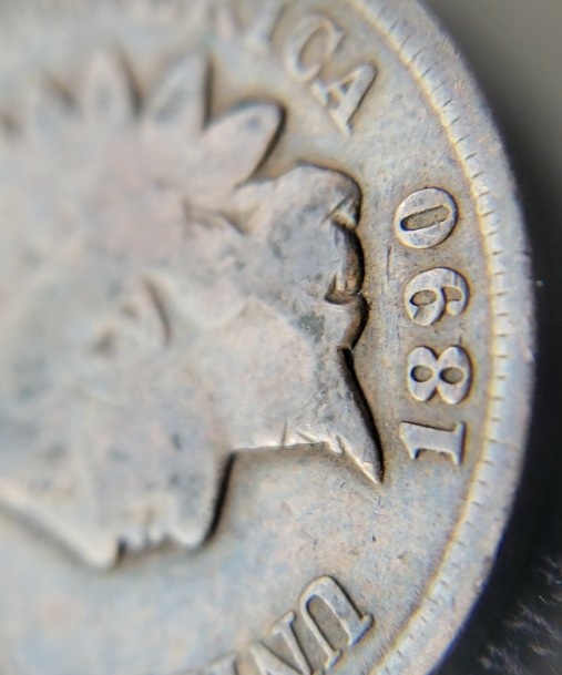 1890-Penny-With-Some-Sort-Over-Overlay-Can-Make-Out-A-7-And-A-Few-Others