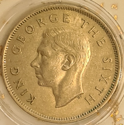 1951-New-Zealand--One-Florin-Die-Clash-Obverse-Near-Kings-Sideburn/Ear