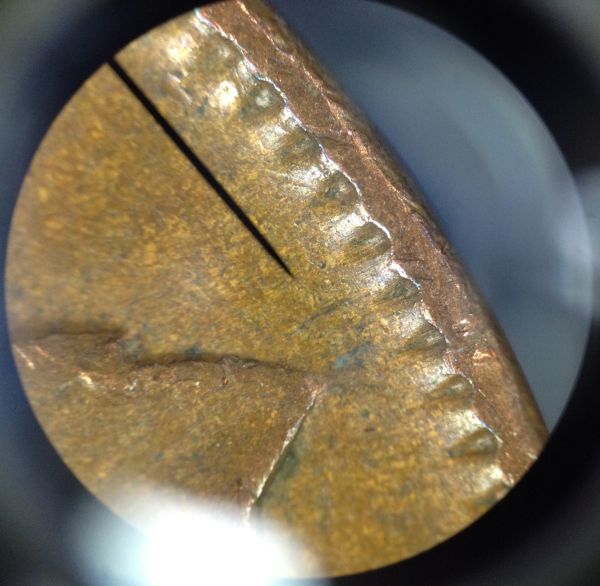 Two-Pennies-That-Are-A-Bit-Odd,-Struck-Through-Grease?
