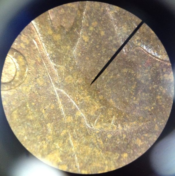 Two-Pennies-That-Are-A-Bit-Odd,-Struck-Through-Grease?