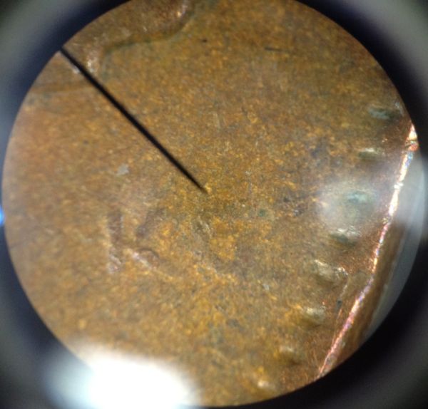 Two-Pennies-That-Are-A-Bit-Odd,-Struck-Through-Grease?
