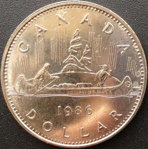 Grade-This-1986-Voyageur-Dollar-Please