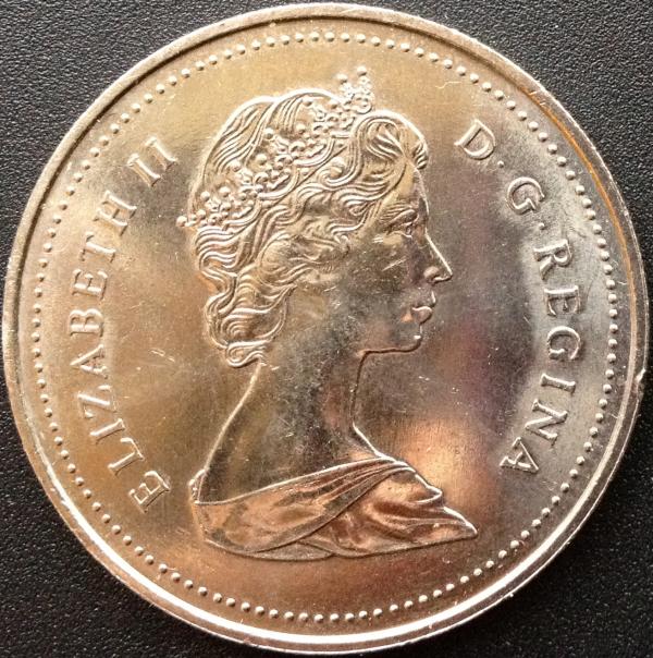 Grade-This-1986-Voyageur-Dollar-Please