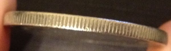 1976-Nickel-Dollar-With-Very-Bad-Bagmarks.-Details-Or-Not?
