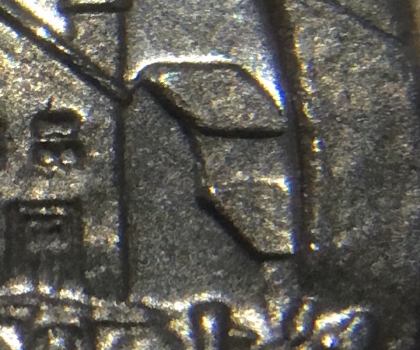 1974-Nickel-Dollar---Curved-Wall?
