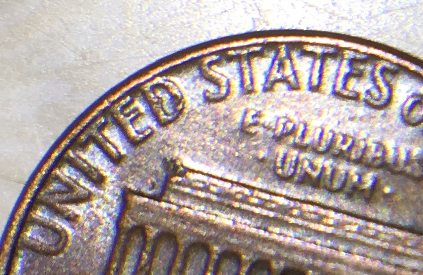 Not-Sure,-Could-Be-Just-Damage,-But-I-See-A-2-On-Lincoln's-Chest