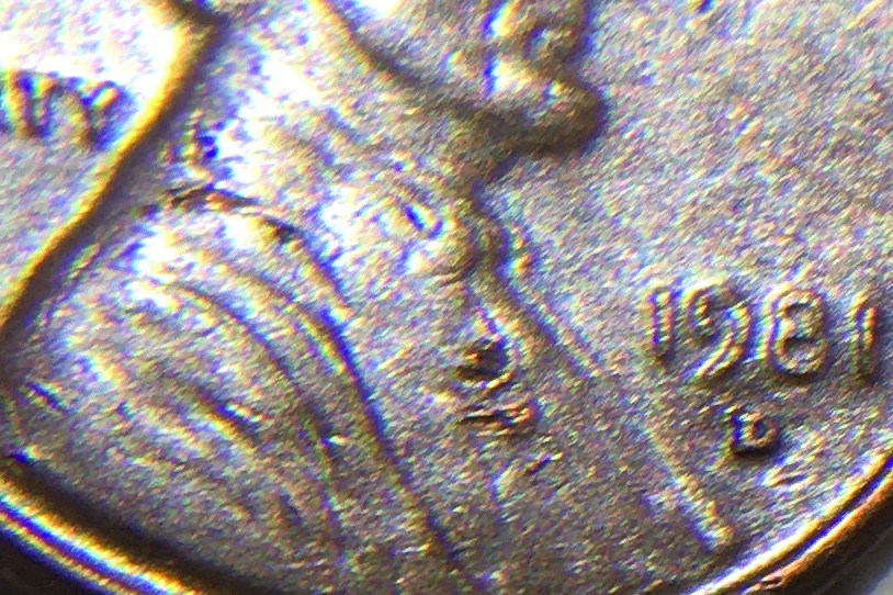 Not-Sure,-Could-Be-Just-Damage,-But-I-See-A-2-On-Lincoln's-Chest