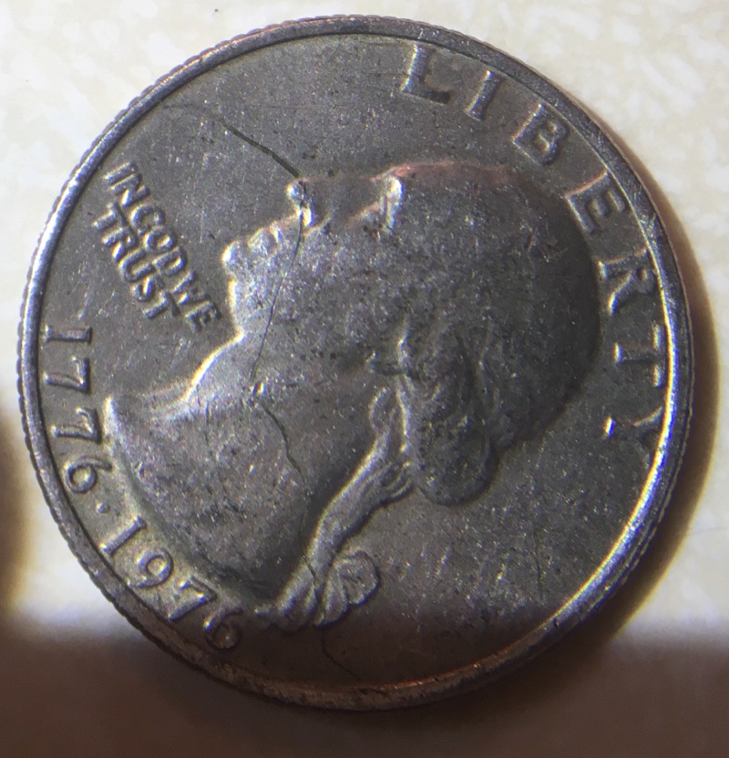 1976-Quarter-With-What-Looks-Like-A-Raised-Drag-Mark...?