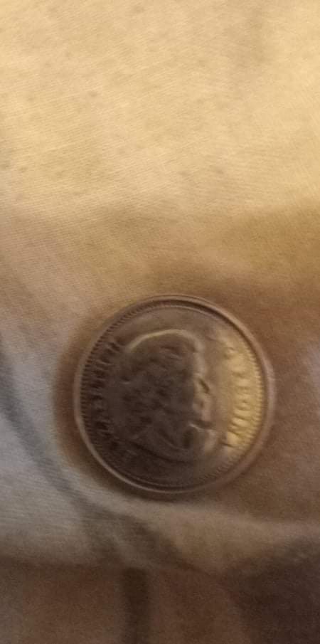Canadian-Error-Coin?-One-Side-Is-The-Queen,-Other-Side-Mostly-Blank