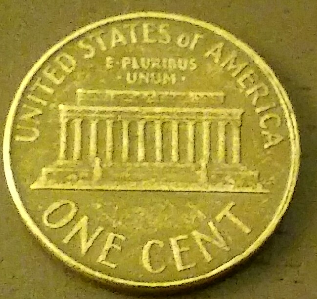 US-1964-D-One-Cent.-Obverse-Shadow-Of-Wings.-Reverse-Similar-To-Quarter?