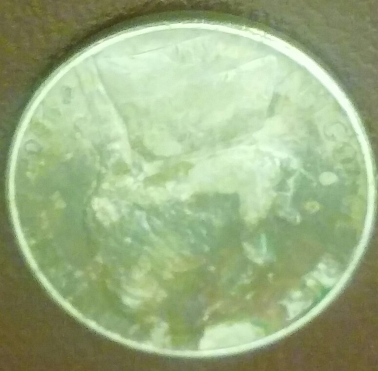 U.-S.-1996-Five-Cents.-Looks-Like-A-Sword-Is-Entering-At-Top-Of-Jefferson's
