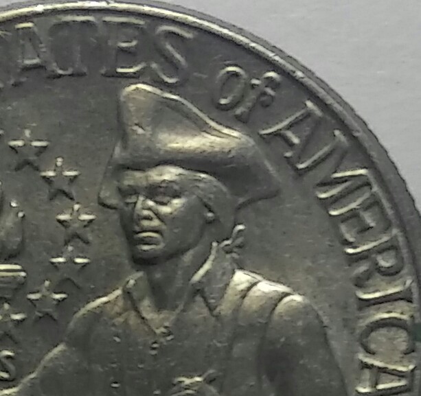 US-1776-1976-D-Cud-On-Reverse-&-Error-On-