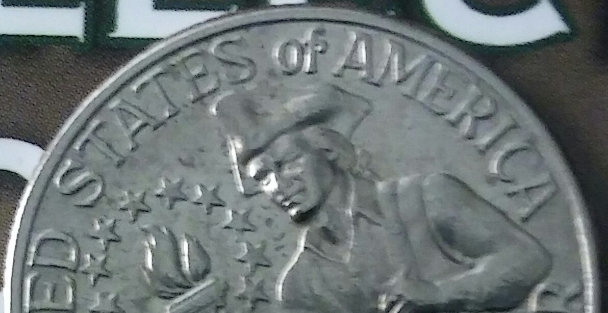 US-1776-1976-D-Cud-On-Reverse-&-Error-On-