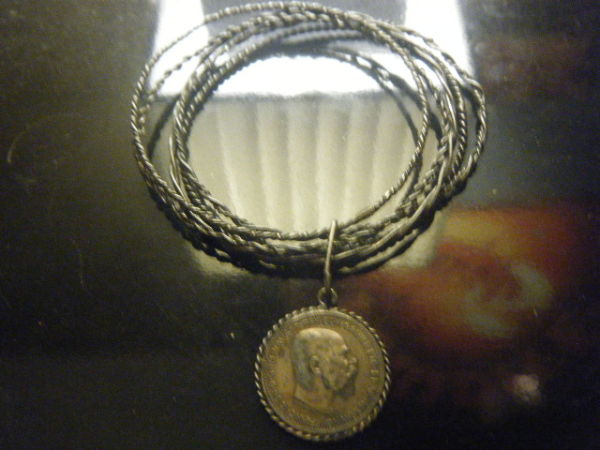 Coin-And-Bracelets,-Don't-Know-If-Silver?