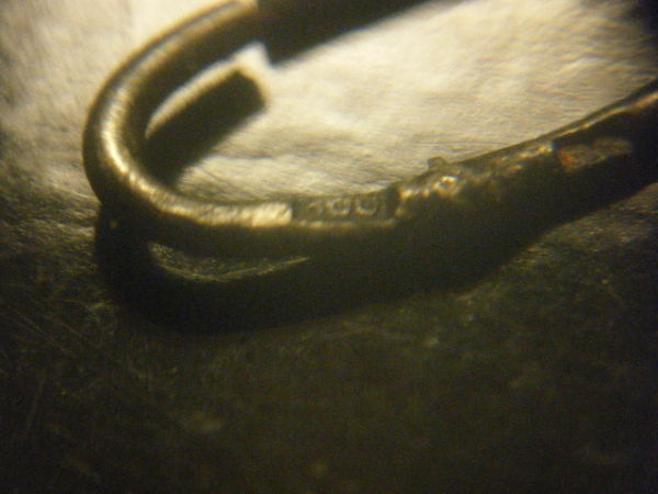 Coin-And-Bracelets,-Don't-Know-If-Silver?