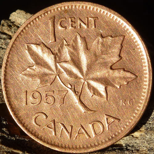 1953-&-57-One-Cent.-Misaligned-Die-And-Rough-Numbers