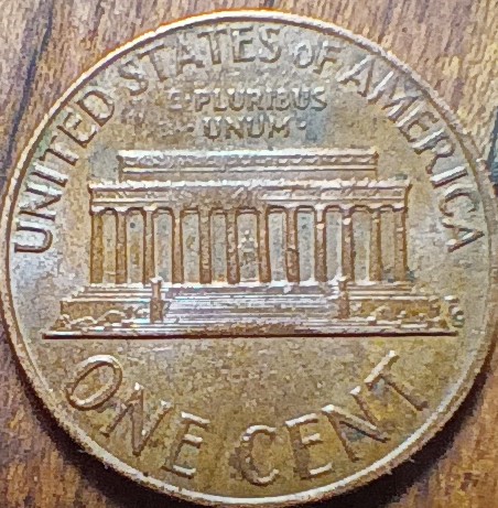 1973-Penny-Obverse-Has-Track-Marks-Across.-The-Surface
