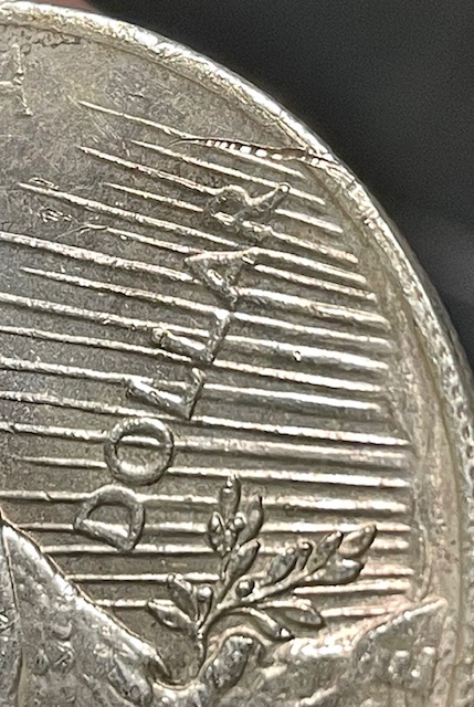 1923-Peace-Dollar-Planchet-Related-Error-Or-Damage?